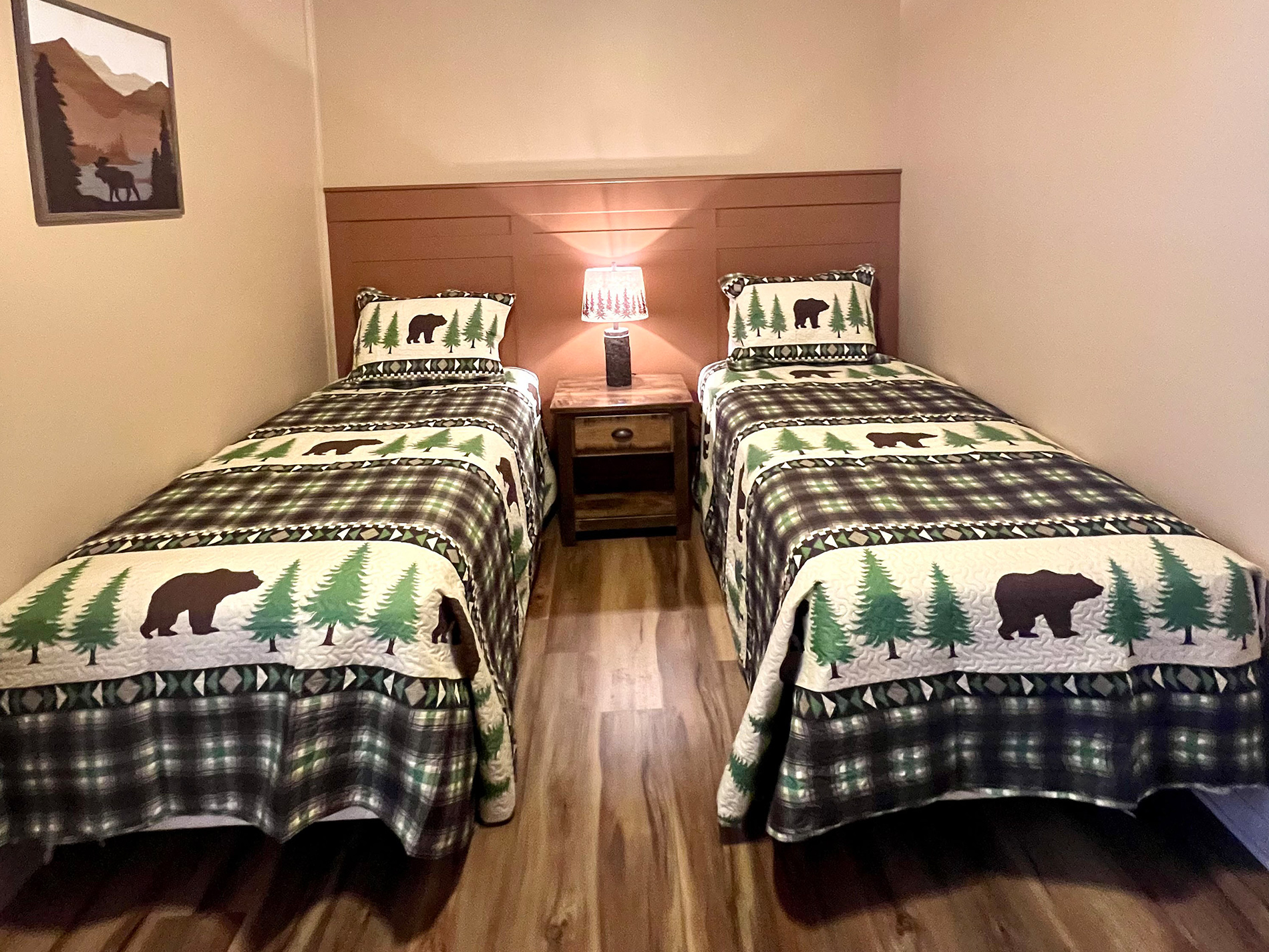 Two single beds with Adirondack bedspreads